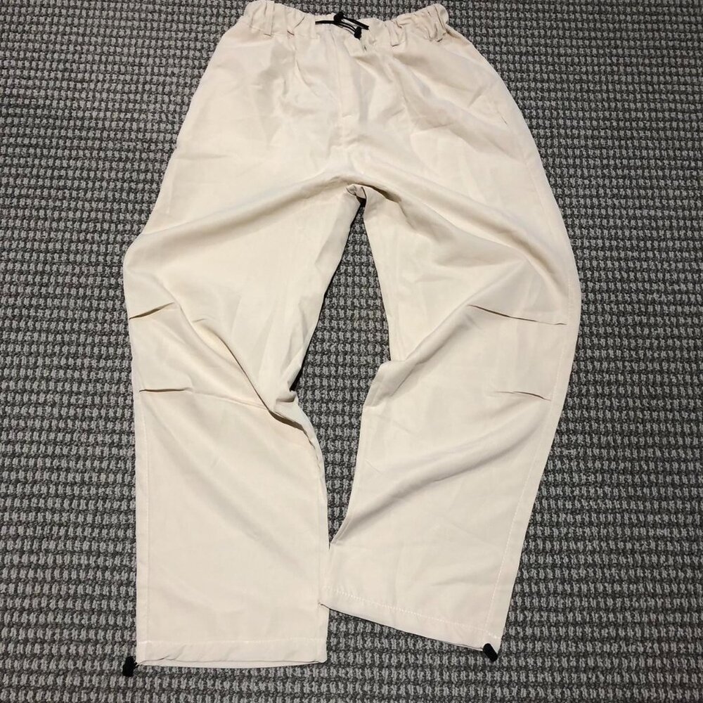 Very baggy Cream and white parachute pants